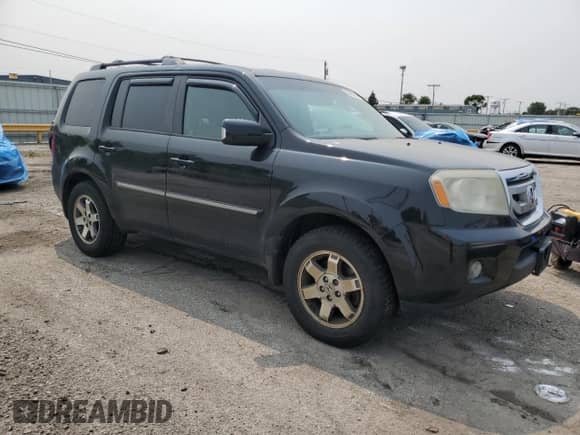 2009 Honda Pilot Touring with VIN 5FNYF38849B011613, listed as a Copart auction lot 58668495 with 299,928 mi miles and Clean title. Bid and sale history available at DreamBid. Image 4.
