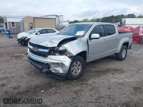 2019 Chevrolet Colorado 2WD Work Truck with VIN 1GCGSBEN3K1164686, listed as a IAAI auction lot 41943796 with 65,000 mi miles and . Bid and sale history available at DreamBid. Image 2.