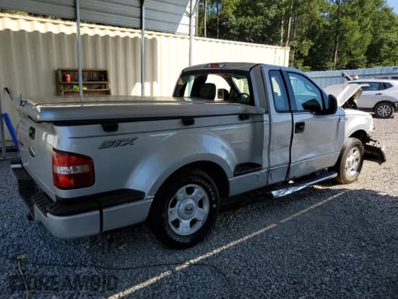 2004 Ford F-150 STX z VIN 1FTRF02WX4KD86718, wystawiony jako Copart lot #67878934 z przebiegiem 216 170 mil mil oraz Szkoda całkowita • Salvage title. Historia ofert i sprzedaży dostępna na DreamBid. Obrazek 3.