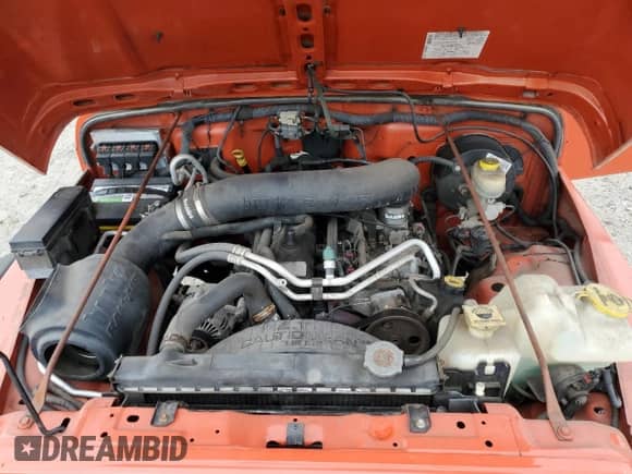 2005 Jeep Wrangler SE z VIN 1J4FA29S75P377103, wystawiony jako Copart lot #80910055 z przebiegiem 103 803 mil mil oraz Szkoda całkowita • Salvage title. Historia ofert i sprzedaży dostępna na DreamBid. Obrazek 11.