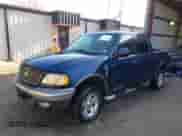 2002 Ford F-150 XLT with VIN 1FTRW086X2KE17566, listed as a IAAI auction lot 41721236 with 98,524 mi miles and . Bid and sale history available at DreamBid. Image 2.