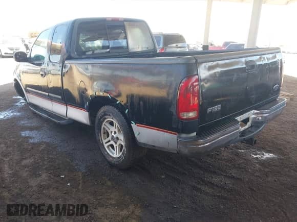 1999 Ford F-150 XL with VIN 1FTRX17L8XKA30905, listed as a IAAI auction lot 41980520 with 309,572 mi miles and . Bid and sale history available at DreamBid. Image 3.