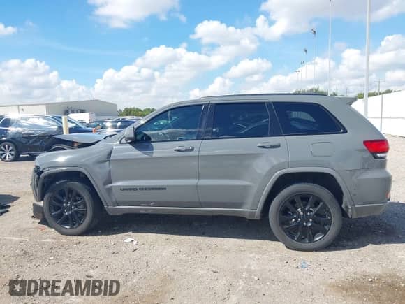 2019 Jeep Grand Cherokee Altitude z VIN 1C4RJEAGXKC832489, wystawiony jako IAAI lot #43379107 z przebiegiem 56 584 mil mil oraz . Historia ofert i sprzedaży dostępna na DreamBid. Obrazek 14.