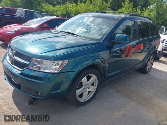 2009 Dodge Journey SXT with VIN 3D4GG57V59T223498, listed as a IAAI auction lot 42648585 with 187,142 mi miles and . Bid and sale history available at DreamBid. Image 19.