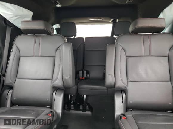 2023 Chevrolet Tahoe RST z VIN 1GNSCRKD4PR393695, wystawiony jako Copart lot #45428455 z przebiegiem Nie podano mil oraz Szkoda całkowita • Salvage title. Historia ofert i sprzedaży dostępna na DreamBid. Obrazek 10.