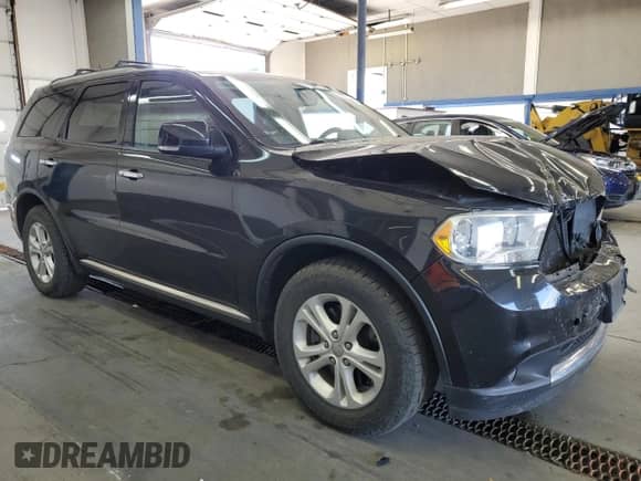 2013 Dodge Durango Crew with VIN 1C4SDJDT1DC509543, listed as a Copart auction lot 80838195 with 136,406 mi miles and Salvage title. Bid and sale history available at DreamBid. Image 4.