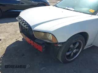 2012 Dodge Charger SE with VIN 2C3CDXBG7CH230997, listed as a IAAI auction lot 43341320 with 151,172 mi miles and . Bid and sale history available at DreamBid. Image 6.