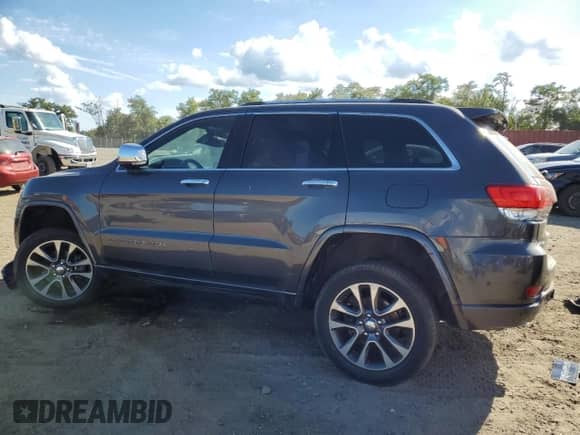 2017 Jeep Grand Cherokee Overland with VIN 1C4RJFCG3HC694208, listed as a Copart auction lot 71187645 with 67,455 mi miles and Salvage title. Bid and sale history available at DreamBid. Image 2.