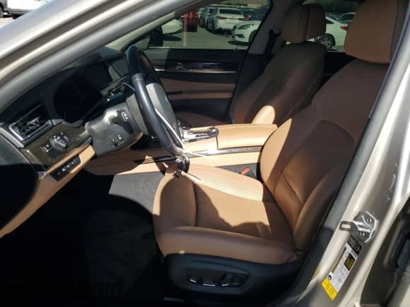 2014 BMW 7 Series 740i с VIN WBAYA6C58ED826697, выставлен на аукционе Copart как лот 57130385 с пробегом 50 107 миль миль и Списание • Salvage title. История ставок и продаж доступна на DreamBid. Изображение 7.