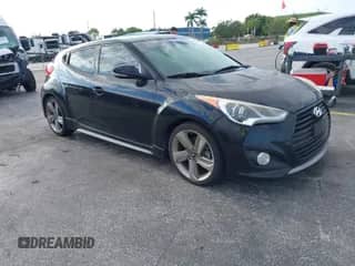2013 Hyundai Veloster Turbo с VIN KMHTC6AE6DU085390, выставлен на аукционе IAAI как лот 42032699 с пробегом 122 483 миль миль и . История ставок и продаж доступна на DreamBid. Изображение 1.