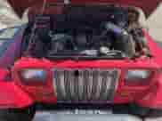 1992 Jeep Wrangler with VIN 2J4FY29S9NJ508783, listed as a Copart auction lot 55336105 with 137,423 mi miles and Salvage title. Bid and sale history available at DreamBid. Image 12.