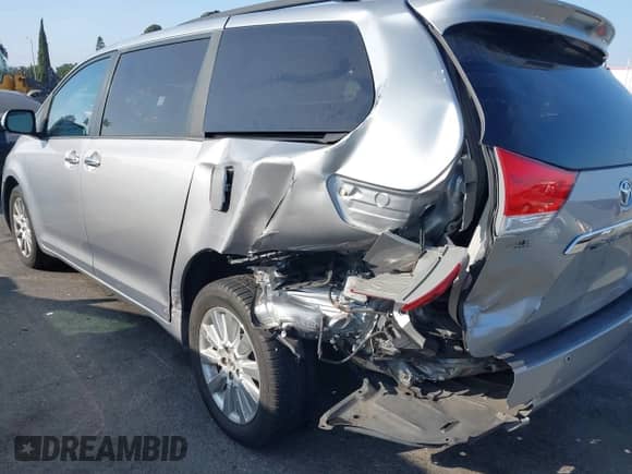 2013 Toyota Sienna XLE AAS with VIN 5TDYK3DC0DS360388, listed as a IAAI auction lot 41163681 with 146,920 mi miles and . Bid and sale history available at DreamBid. Image 6.