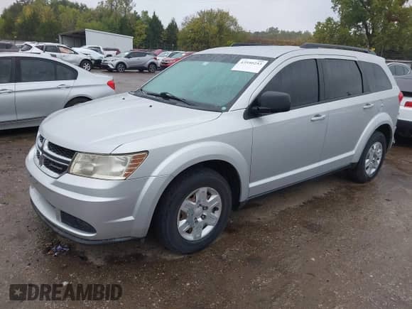 2011 Dodge Journey Express z VIN 3D4PG4FB7BT516245, wystawiony jako IAAI lot #43550253 z przebiegiem 165 955 mil mil oraz . Historia ofert i sprzedaży dostępna na DreamBid. Obrazek 2.