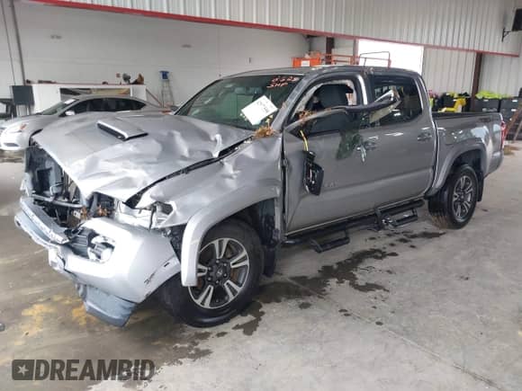 2017 Toyota Tacoma SR5 with VIN 5TFAZ5CN9HX031054, listed as a IAAI auction lot 42977558 with 150,662 mi miles and . Bid and sale history available at DreamBid. Image 17.