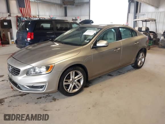 2015 Volvo S60 T5 Drive-E Premier with VIN YV126MFK7F1337818, listed as a IAAI auction lot 42680724 with 125,805 mi miles and . Bid and sale history available at DreamBid. Image 2.