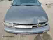 1991 Chevrolet Caprice с VIN 1G1BN53E4MW194283, выставлен на аукционе Copart как лот 71869145 с пробегом 33 840 миль миль и Списание • Salvage title. История ставок и продаж доступна на DreamBid. Изображение 11.