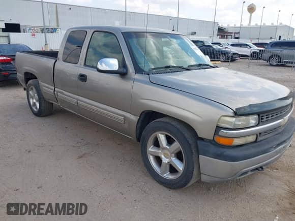 2002 Chevrolet Silverado 1500 LS with VIN 2GCEC19T221270290, listed as a IAAI auction lot 43084494 with 126,807 mi miles and . Bid and sale history available at DreamBid. Image 1.