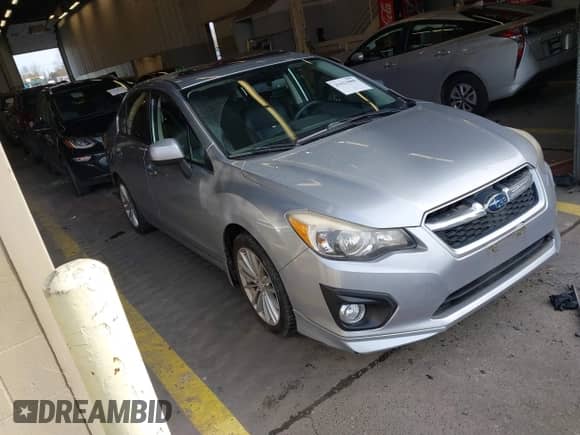 2012 Subaru Impreza Limited z VIN JF1GJAK69CH017703, wystawiony jako IAAI lot #41623080 z przebiegiem 53 105 mil mil oraz . Historia ofert i sprzedaży dostępna na DreamBid. Obrazek 1.