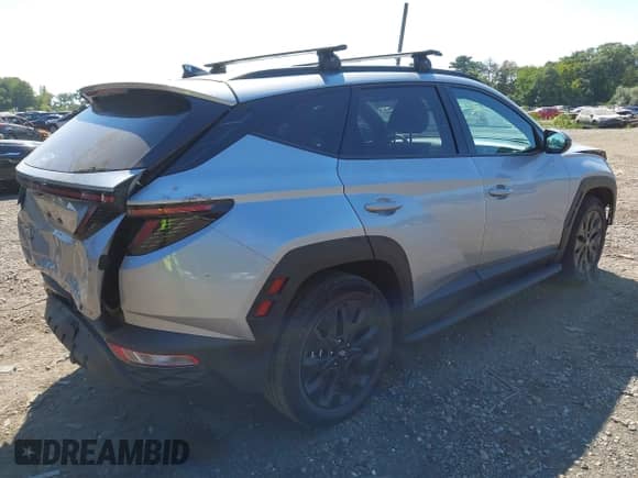 2024 Hyundai Tucson XRT with VIN KM8JFCDE4RU293476, listed as a IAAI auction lot 43197078 with 3,840 mi miles and . Bid and sale history available at DreamBid. Image 4.