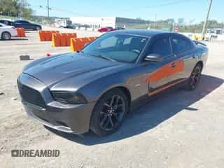 2013 Dodge Charger SE with VIN 2C3CDXBG5DH636682, listed as a IAAI auction lot 43428831 with 182,623 mi miles and . Bid and sale history available at DreamBid. Image 2.