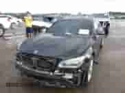 2014 BMW 7 Series ALPINA B7 with VIN WBAYE8C5XED135784, listed as a IAAI auction lot 43039631 with 103,428 mi miles and . Bid and sale history available at DreamBid. Image 2.