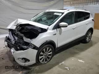 2017 Ford Escape Titanium с VIN 1FMCU9JD1HUD63642, выставлен на аукционе Copart как лот 71541355 с пробегом Не указан миль и Списание • Salvage title. История ставок и продаж доступна на DreamBid. Изображение 1.