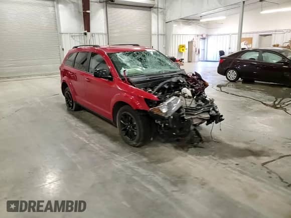 2019 Dodge Journey SE with VIN 3C4PDCBG5KT868984, listed as a Copart auction lot 70161695 with 210,593 mi miles and Salvage title. Bid and sale history available at DreamBid. Image 14.