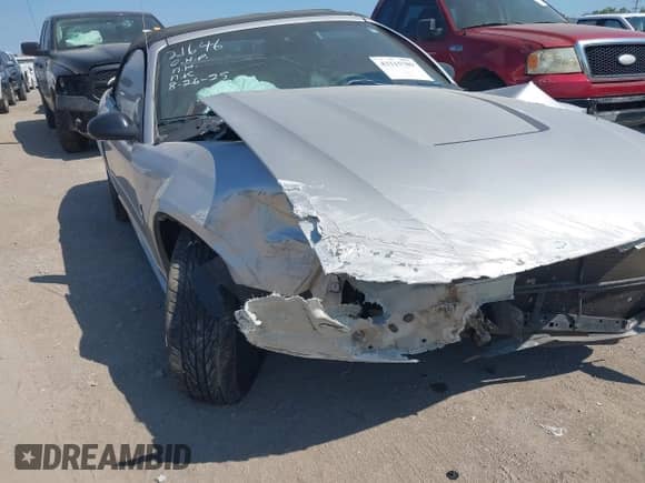 2003 Ford Mustang Deluxe z VIN 1FAFP44403F377882, wystawiony jako IAAI lot #43115789 z przebiegiem 77 266 mil mil oraz . Historia ofert i sprzedaży dostępna na DreamBid. Obrazek 6.