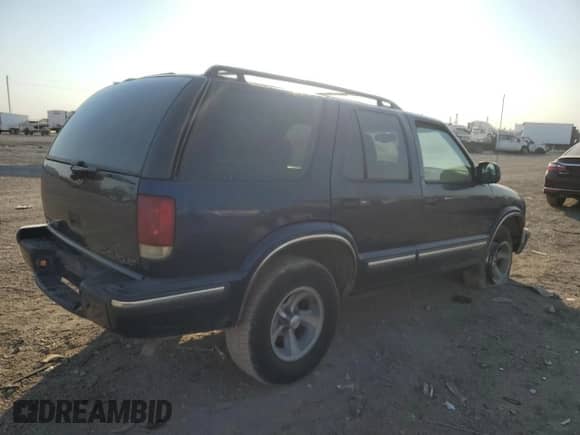 1999 Chevrolet Blazer LS z VIN 1GNCS13W9X2194269, wystawiony jako Copart lot #75468004 z przebiegiem 154 501 mil mil oraz Szkoda całkowita • Salvage title. Historia ofert i sprzedaży dostępna na DreamBid. Obrazek 3.
