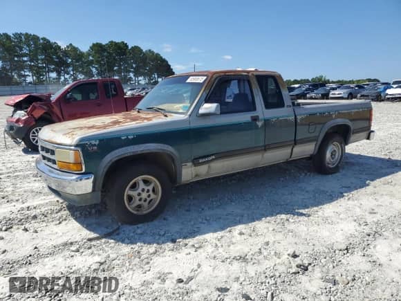 1994 Dodge Dakota z VIN 1B7GL23Y6RS602230, wystawiony jako Copart lot #65988615 z przebiegiem 224 632 mil mil oraz Czysty tytuł • Clean title. Historia ofert i sprzedaży dostępna na DreamBid. Obrazek 1.