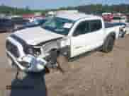 2021 Toyota Tacoma SR5 with VIN 3TMAZ5CN8MM152710, listed as a IAAI auction lot 43148239 with 40,000 mi miles and . Bid and sale history available at DreamBid. Image 2.