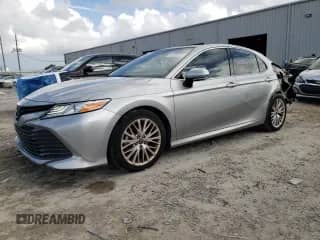 2020 Toyota Camry XLE с VIN 4T1F11AK2LU919357, выставлен на аукционе Copart как лот 82326245 с пробегом 34 570 миль миль и На запчасти • Non repairable. История ставок и продаж доступна на DreamBid. Изображение 1.