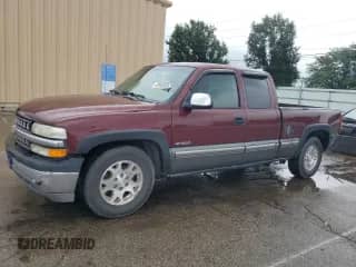2000 Chevrolet Silverado 1500 LS with VIN 2GCEC19V3Y1402385, listed as a Copart auction lot 62993955 with 243,729 mi miles and Salvage title. Bid and sale history available at DreamBid. Image 1.