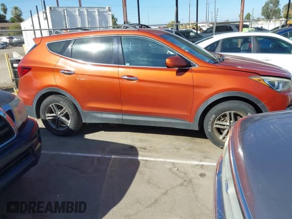 2017 Hyundai Santa Fe 2.4L z VIN 5XYZTDLB1HG443833, wystawiony jako IAAI lot #42908168 z przebiegiem 137 312 mil mil oraz . Historia ofert i sprzedaży dostępna na DreamBid. Obrazek 13.