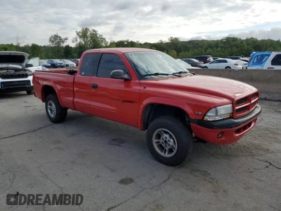1999 Dodge Dakota SLT z VIN 1B7GG22Y3XS136064, wystawiony jako Copart lot #69782945 z przebiegiem 88 568 mil mil oraz Szkoda całkowita • Salvage title. Historia ofert i sprzedaży dostępna na DreamBid. Obrazek 4.