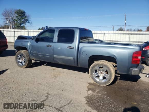 2007 Chevrolet Silverado 1500 1LT with VIN 2GCEC130571691250, listed as a Copart auction lot 85279254 with 105,573 mi miles and Salvage title. Bid and sale history available at DreamBid. Image 2.