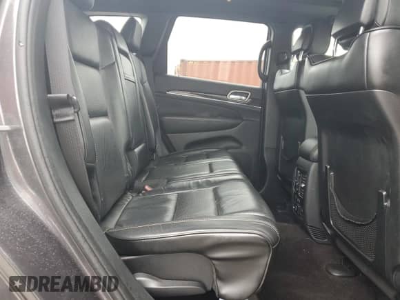 2017 Jeep Grand Cherokee Overland with VIN 1C4RJECG5HC605538, listed as a Copart auction lot 81946415 with 100,658 mi miles and Salvage title. Bid and sale history available at DreamBid. Image 11.