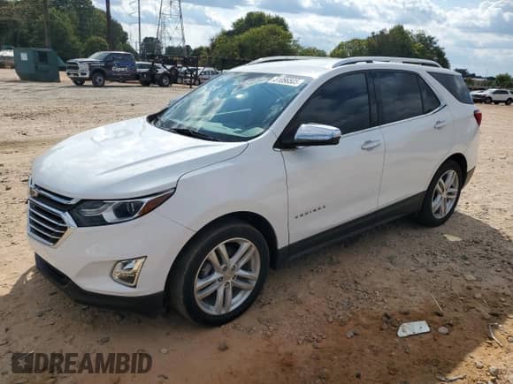 2020 Chevrolet Equinox Premier с VIN 3GNAXXEV2LS643113, выставлен на аукционе Copart как лот 81096505 с пробегом 72 316 миль миль и Списание • Salvage title. История ставок и продаж доступна на DreamBid. Изображение 1.