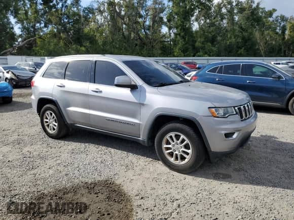 2018 Jeep Grand Cherokee Laredo E с VIN 1C4RJEAGXJC277915, выставлен на аукционе Copart как лот 84617205 с пробегом 146 979 миль миль и Чистый • Clean title. История ставок и продаж доступна на DreamBid. Изображение 4.