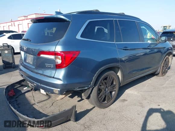 2021 Honda Pilot Special Edition with VIN 5FNYF6H21MB007234, listed as a IAAI auction lot 43236283 with 59,240 mi miles and . Bid and sale history available at DreamBid. Image 4.