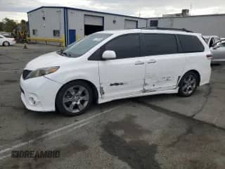 2014 Toyota Sienna SE with VIN 5TDXK3DC2ES520428, listed as a Copart auction lot 82166805 with 161,322 mi miles and Salvage title. Bid and sale history available at DreamBid. Image 1.