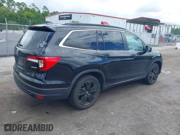 2021 Honda Pilot Special Edition z VIN 5FNYF5H23MB047423, wystawiony jako IAAI lot #42751381 z przebiegiem 56 183 mil mil oraz . Historia ofert i sprzedaży dostępna na DreamBid. Obrazek 4.