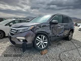 2017 Honda Pilot Elite с VIN 5FNYF6H04HB020693, выставлен на аукционе Copart как лот 81411135 с пробегом Не указан миль и Списание • Salvage title. История ставок и продаж доступна на DreamBid. Изображение 1.