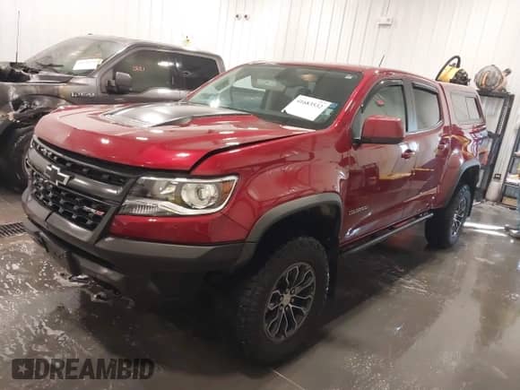 2020 Chevrolet Colorado 4WD ZR2 с VIN 1GCGTEENXL1199452, выставлен на аукционе IAAI как лот 41683532 с пробегом 40 754 миль миль и . История ставок и продаж доступна на DreamBid. Изображение 18.
