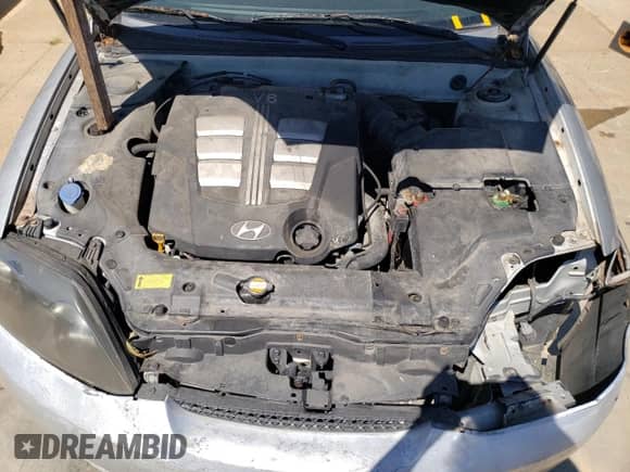 2006 Hyundai Tiburon GT с VIN KMHHN65F76U216025, выставлен на аукционе Copart как лот 74443474 с пробегом 139 626 миль миль и На запчасти • Non repairable. История ставок и продаж доступна на DreamBid. Изображение 7.