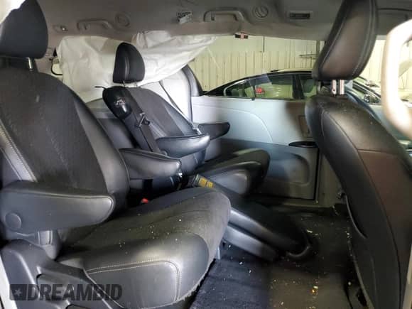 2014 Toyota Sienna SE with VIN 5TDXK3DC7ES482016, listed as a Copart auction lot 69857475 with 136,304 mi miles and Salvage title. Bid and sale history available at DreamBid. Image 11.