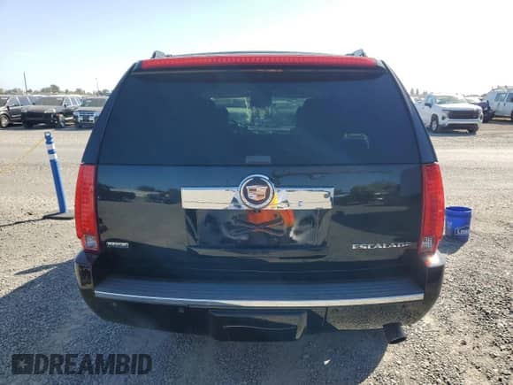 2011 Cadillac Escalade Premium with VIN 1GYS4CEFXBR381814, listed as a Copart auction lot 85574955 with 153,538 mi miles and Salvage title. Bid and sale history available at DreamBid. Image 6.