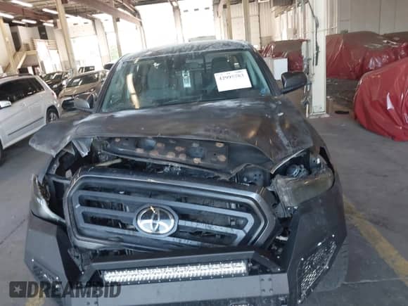 2021 Toyota Tacoma TRD Off Road с VIN 3TMCZ5AN2MM403751, выставлен на аукционе IAAI как лот 42995783 с пробегом Не указан миль и . История ставок и продаж доступна на DreamBid. Изображение 6.