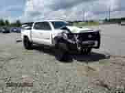 2018 Toyota Tacoma SR with VIN 5TFCZ5ANXJX162902, listed as a Copart auction lot 68464895 with 105,750 mi miles and Salvage title. Bid and sale history available at DreamBid. Image 14.