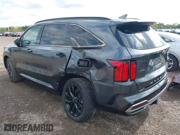 2021 Kia Sorento SX Prestige X-Line with VIN 5XYRKDLF2MG041934, listed as a IAAI auction lot 43290527 with 63,769 mi miles and . Bid and sale history available at DreamBid. Image 3.